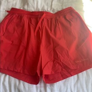 OV Doing Things shorts in bright red